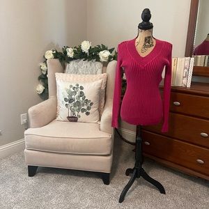 Lei Junior long sleeve V neck knit sweater.